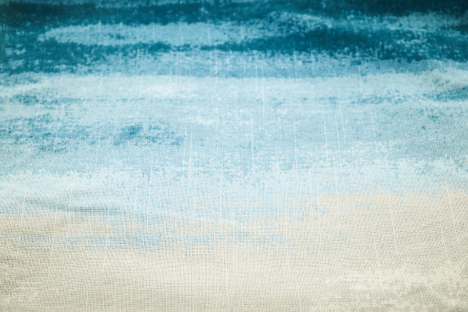 Hand-dyed woven textile close up